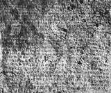 The Rabatak inscription is an inscription written on a rock in the Bactrian language and the Greek script, which was found in 1993 at the site of Rabatak, near Surkh Kotal in Afghanistan. The inscription relates to the rule of the Kushan emperor Kanishka, and gives remarkable clues on the genealogy of the Kushan dynasty.<br/><br/>

The Bactrian language is an extinct Eastern Iranian language which was spoken in the Central Asian region of Bactria. Linguistically, it is classified as belonging to the middle period of the Northeastern Iranian branch.<br/><br/>

Because Bactrian was written predominantly with the Greek alphabet, Bactrian is sometimes referred to as 'Greco-Bactrian', 'Kushan' or 'Kushano-Bactrian'.